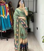 teal color  all over printed shimmer saree with unstitched blouse