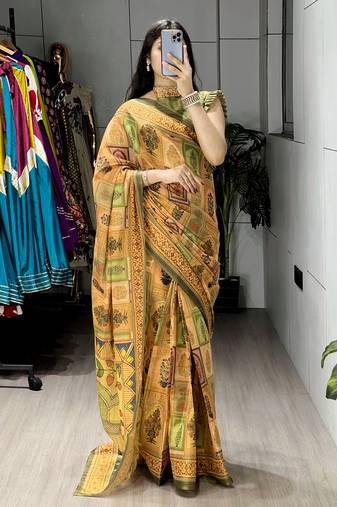 mustard color  all over printed shimmer saree with unstitched blouse