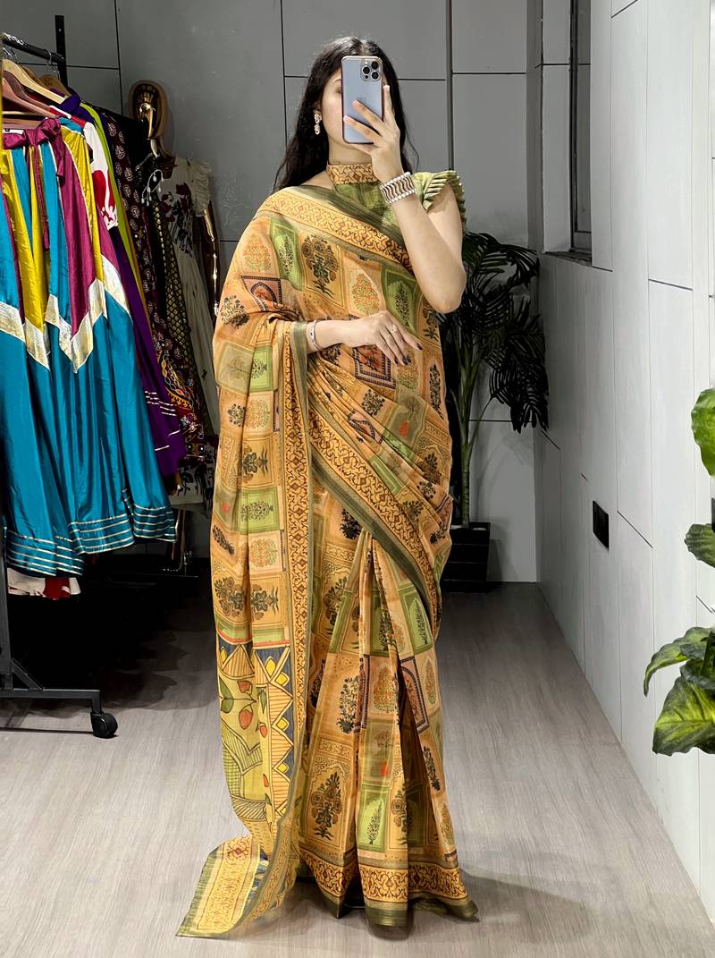 mustard color  all over printed shimmer saree with unstitched blouse