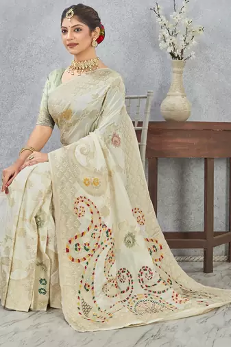 off-white color banarasi silk blend meenakari work  saree with blouse