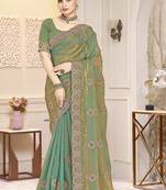 Blue color  zirkon work & codding embroidered fendy satin silk  saree with blouse