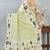 Lemon color zirkon cut border worksatin digital printed saree with blouse