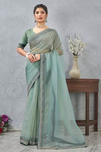 light green color zirkon work border soft silk blend saree with blouse