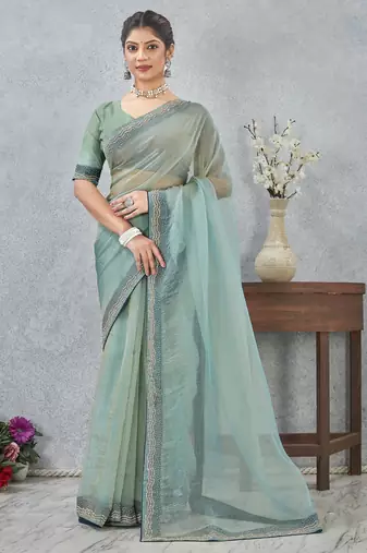 light green color zirkon work border soft silk blend saree with blouse