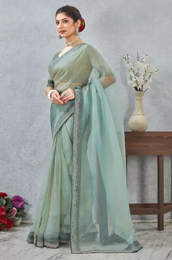 light green color zirkon work border soft silk blend saree with blouse
