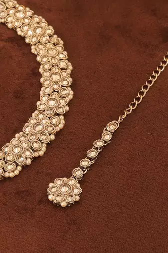 brown alloy choker set with kundan stone work