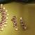 Round shape pearl guchha antique gold plated red kundan stone brass choker necklace set for women