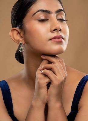 green silver drop earrings with gold plated stone work 1