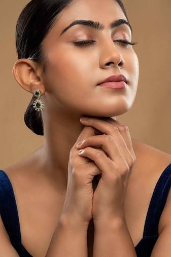 green silver drop earrings with gold plated stone work