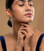 green silver drop earrings with gold plated stone work