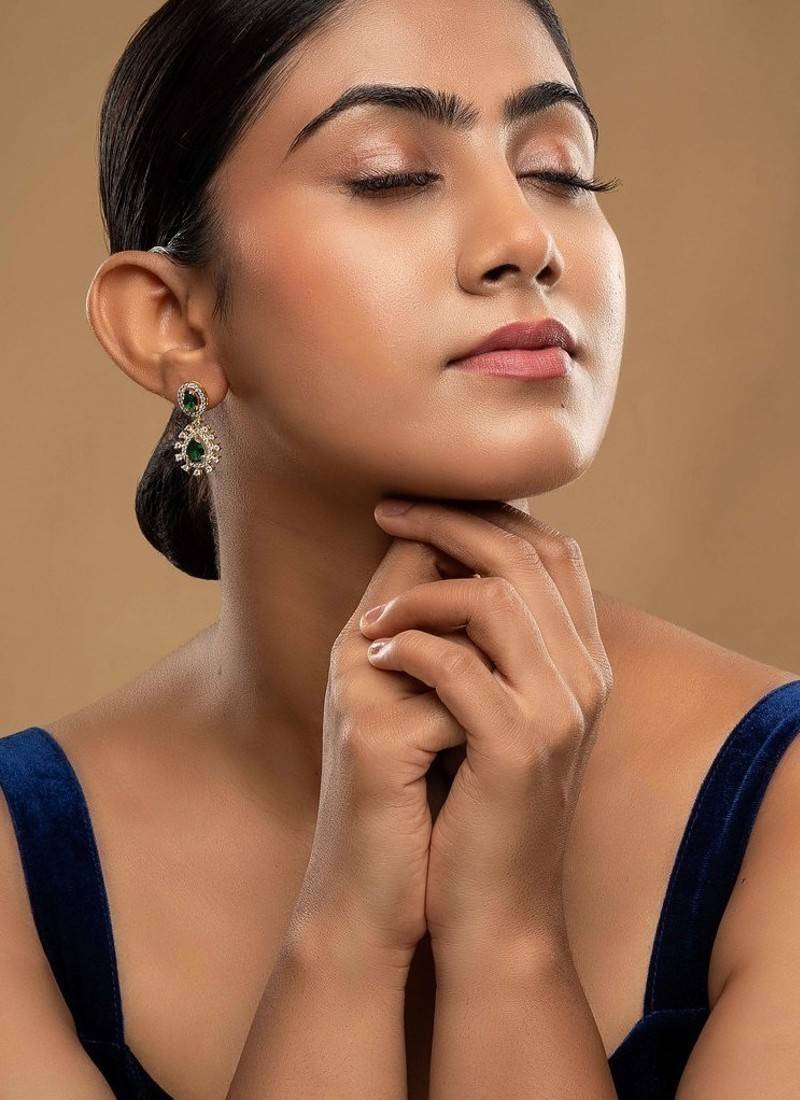 green silver drop earrings with gold plated stone work