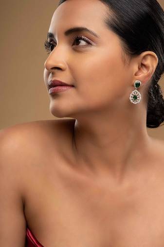 green sterling silver dangler earrings with gold finish