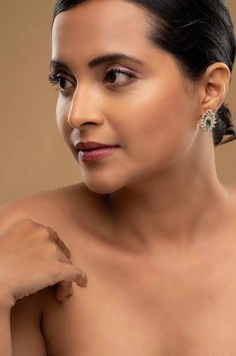 green sterling silver earrings with stone design