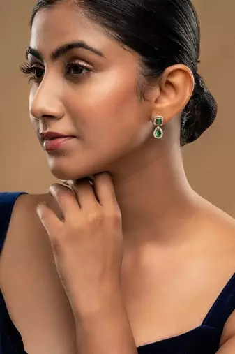 green sterling silver dangler earrings with stone work