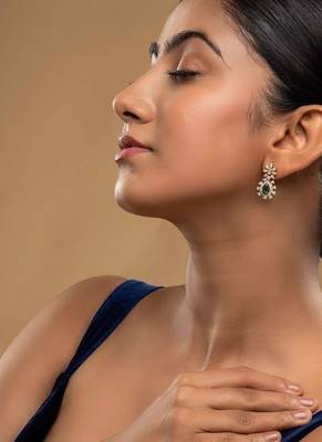 green silver dangler earrings with gold plated finish 1