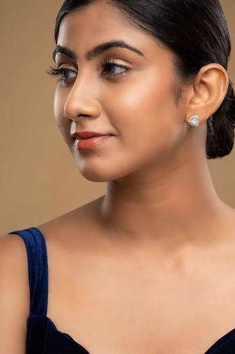 white sterling silver earrings with polished design