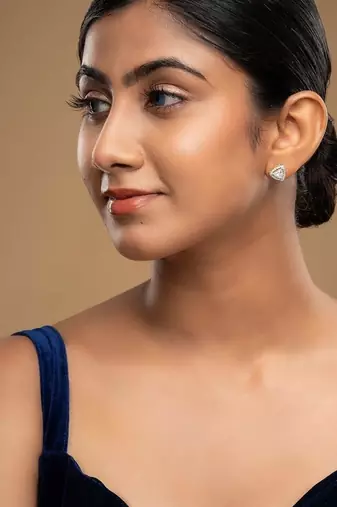 white sterling silver earrings with polished design