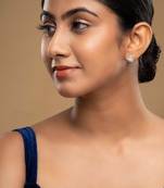 white sterling silver earrings with polished design