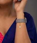 white silver watch charm with gold plated texture