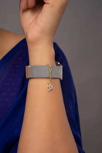 white silver watch charm with gold plated detailing