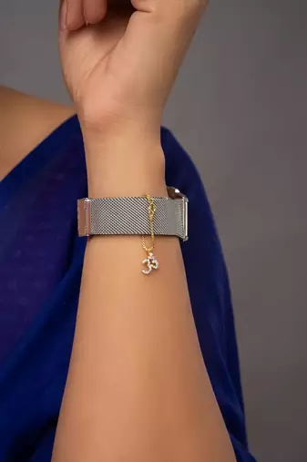 white silver watch charm with gold plated detailing