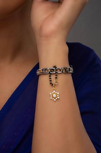white silver watch charm with gold plated surface