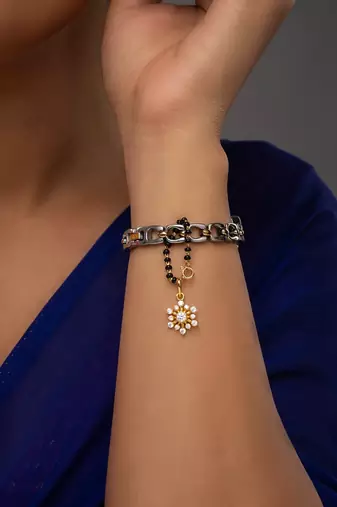 white silver watch charm with gold plated surface