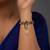 white silver watch charm with gold plated surface