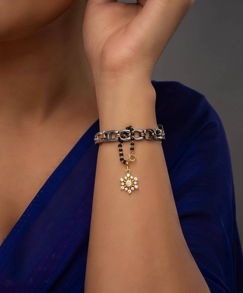 white silver watch charm with gold plated surface