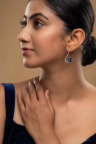  blue silver dangler earrings with gold stone drop design