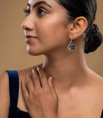  blue silver dangler earrings with gold stone drop design