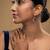  blue silver dangler earrings with gold stone drop design