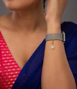 white silver watch charm with gold plated motif