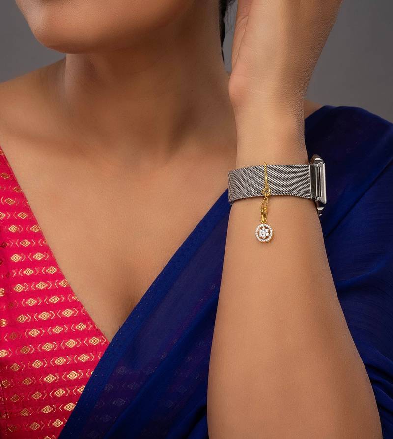 white silver watch charm with gold plated motif