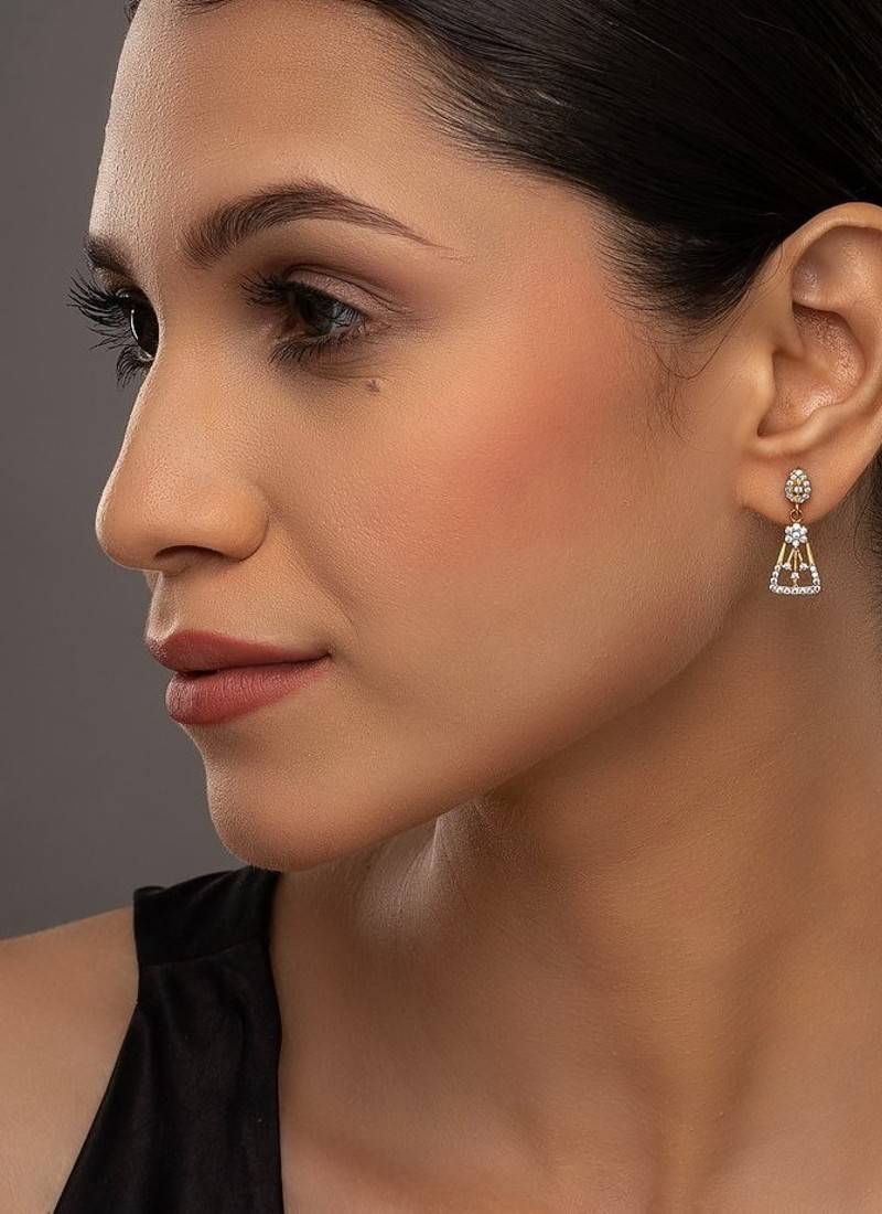 white silver dangler earrings with gold plated sleek design