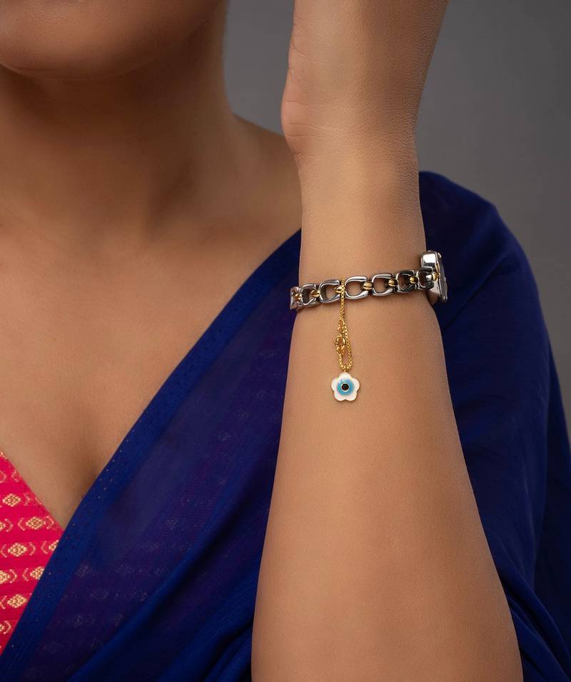 blue silver watch charm with gold plated stone work