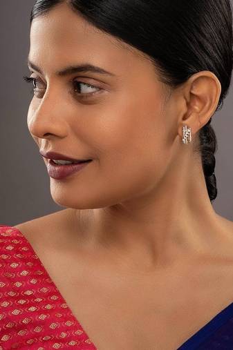 white silver earrings with gold plated minimal drop design