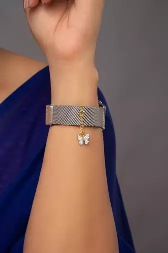white silver watch charm with gold plated detail