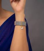 white silver watch charm with gold plated detail