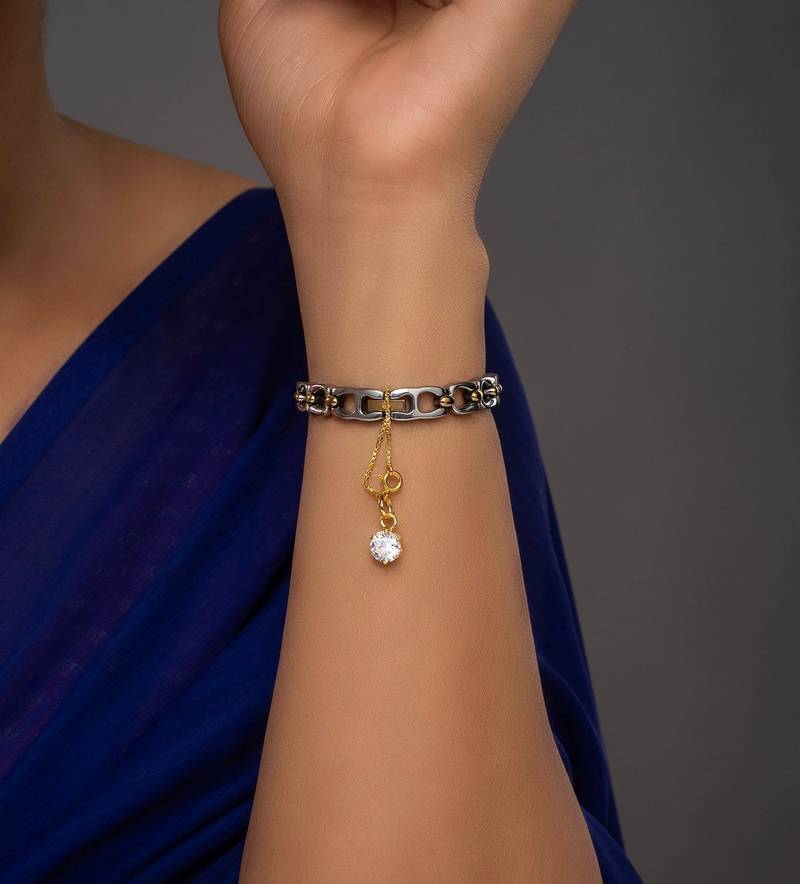 white silver watch charm with gold plated finish work