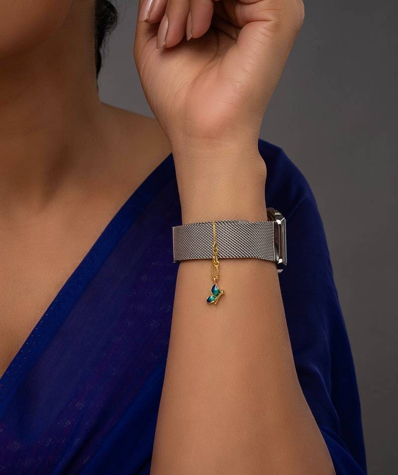 blue silver watch charm with gold plated stone design