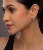white silver earrings with gold sleek long dangler style