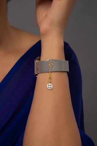 white silver watch charm with gold plated accent
