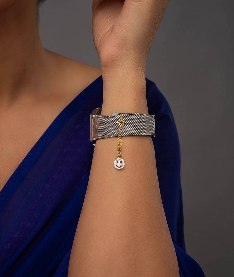 white silver watch charm with gold plated accent