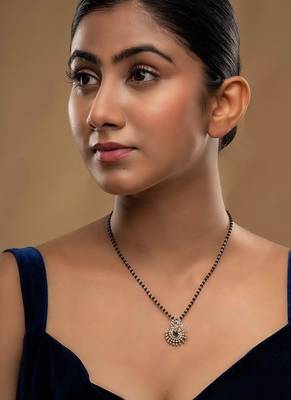 green silver mangalsutra with black bead gold locket 1