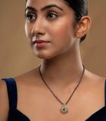 green silver mangalsutra with black bead gold locket