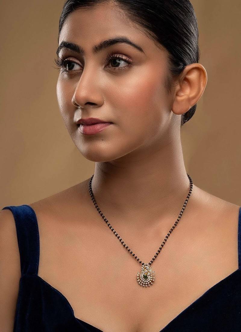 green silver mangalsutra with black bead gold locket