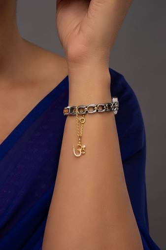 white silver watch charm with gold plated work