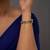 white silver watch charm with gold plated work