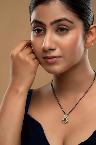 green silver mangalsutra with gold bead stone pendant